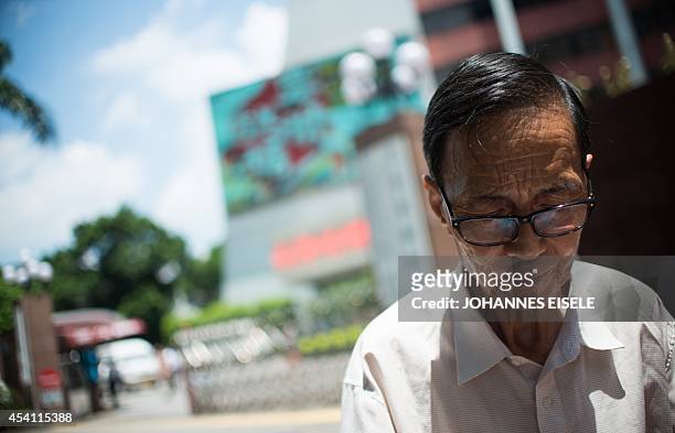 China-language-politics-Guangdong,FEATURE by Felicia SONMEZ This photo taken on August 11, 2014 shows Zhang Yiyi, a professor of French in front of...