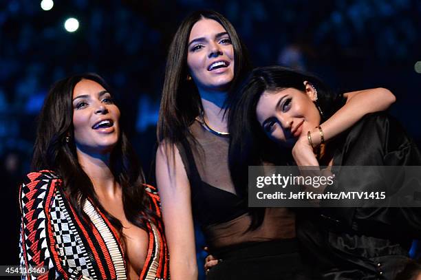 Personalities Kim Kardashian, Kendall Jenner and Kylie Jenner attend the 2014 MTV Video Music Awards at The Forum on August 24, 2014 in Inglewood,...