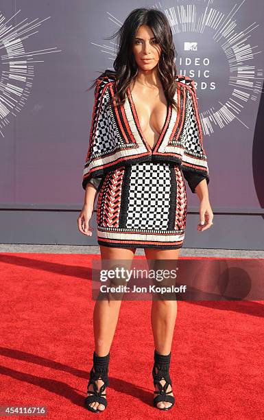 Kim Kardashian arrives at the 2014 MTV Video Music Awards at The Forum on August 24, 2014 in Inglewood, California.