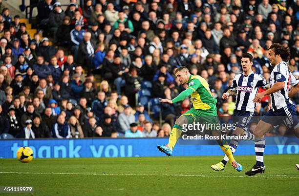 Gary Hooper of Norwich shoots and scores during the Barclays Premier League match between West Bromwich Albion and Norwich City at The Hawthorns on...