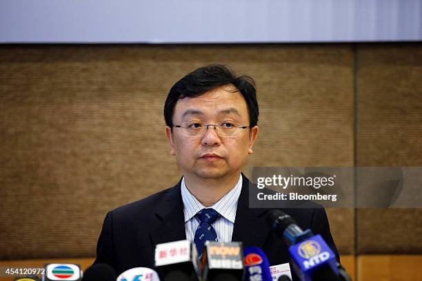 Wang Chuanfu, chairman of BYD Co., attends a news conference in Hong Kong, on Monday, Aug. 25, 2014. BYD, a Chinese electric-car maker partially...