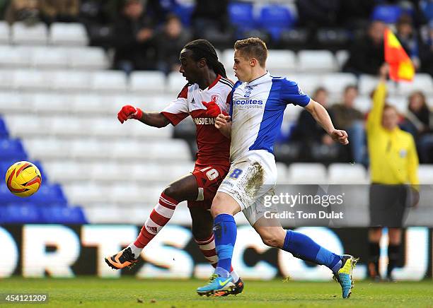 Mitch Hancox of Birmingham City and Marvin Emnes of Middlesbrough chase the ball during the Sky Bet Championship match between Birmingham City and...