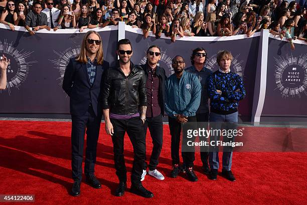 Musicians Mickey Madden, Jesse Carmichael, Adam Levine, James Valentine, Matt Flynn, and PJ Morton of Maroon 5 arrive to the 2014 MTV Video Music...