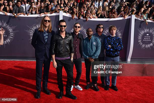 Musicians Mickey Madden, Jesse Carmichael, Adam Levine, James Valentine, Matt Flynn, and PJ Morton of Maroon 5 arrive to the 2014 MTV Video Music...