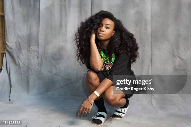 Poses for a portrait backstage during day 2 of the AFROPUNK festival at Commodore Barry Park on August 24, 2014 in Brooklyn, New York.