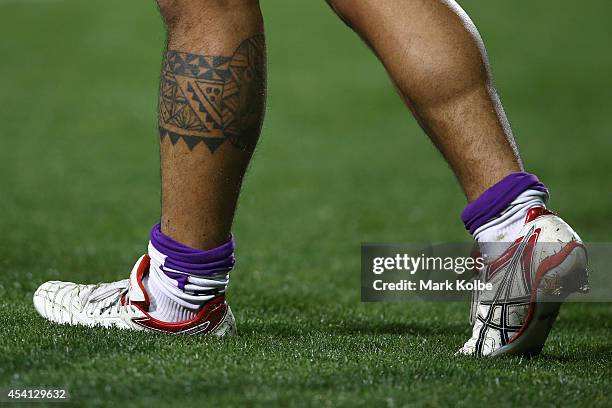 General view is seen of Mahe Fonua of the Storm's legs and tattoo during the round 24 NRL match between the Penrith Panthers and the Melbourne Storm...