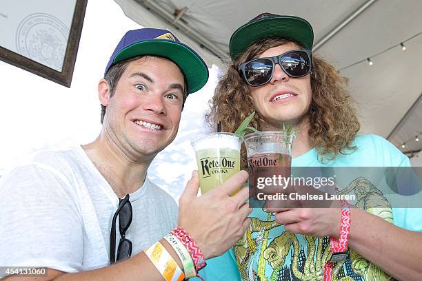 Actors / comedians Adam DeVine and Blake Anderson visit the De Nolet FYF lounge, presented by Ketel One Vodka on August 24, 2014 in Los Angeles,...