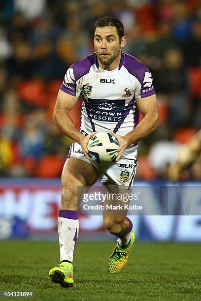 Cameron Smith of the Storm runs the ball during the round 24 NRL match between the Penrith Panthers and the Melbourne Storm at Sportingbet Stadium on...
