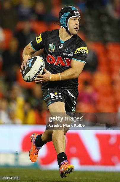 Jamie Soward of the Panthers runs the ball during the round 24 NRL match between the Penrith Panthers and the Melbourne Storm at Sportingbet Stadium...