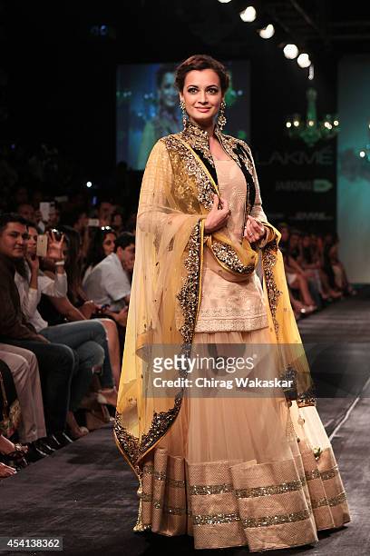 Dia Mirza showcases designs by Vikram Phadnis during day 5 of Lakme Fashion Week Winter/Festive 2014 at The Palladium Hotel on August 24, 2014 in...