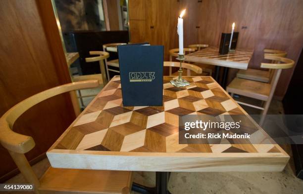 People's Eatery's small dinning section with wooden marquetry tables, on Spadina Avenue. Photographed on August 22, 2014.