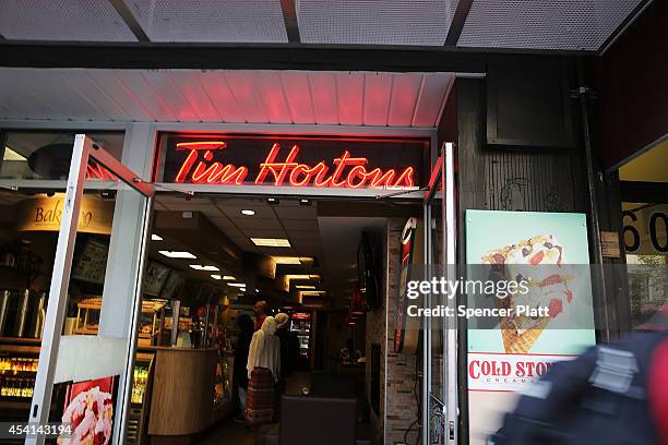 Tim Horton's cafe is seen in Manhattan on August 25, 2014 in New York City. It has been confirmed that American fast food giant Burger King is in...