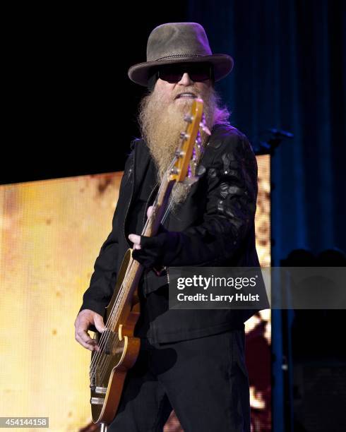 Dusty Hill is performing with 'Z Z Top' at Fiddlers Green in Englewood, Colorado on August 20, 2014.
