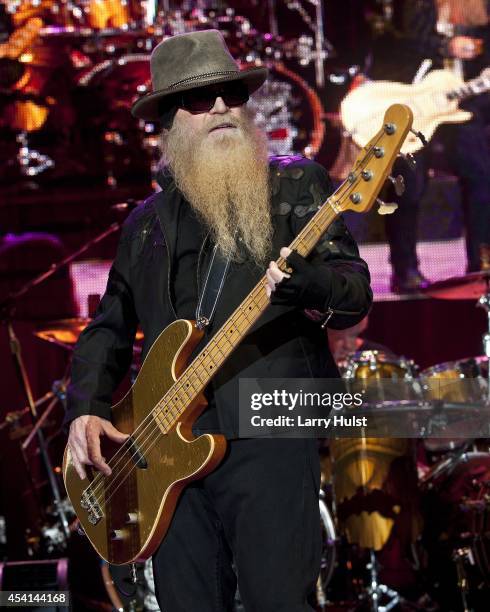 Dusty Hill is performing with 'Z Z Top' at Fiddlers Green in Englewood, Colorado on August 20, 2014.