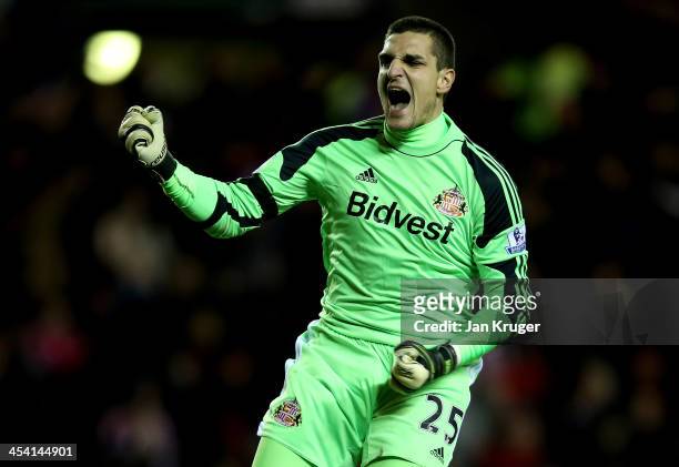 Vito Mannone, Goalkeeper of Sunderland celebrates the first goal by team mate Adam Johnson during the Barclays Premier League match between...
