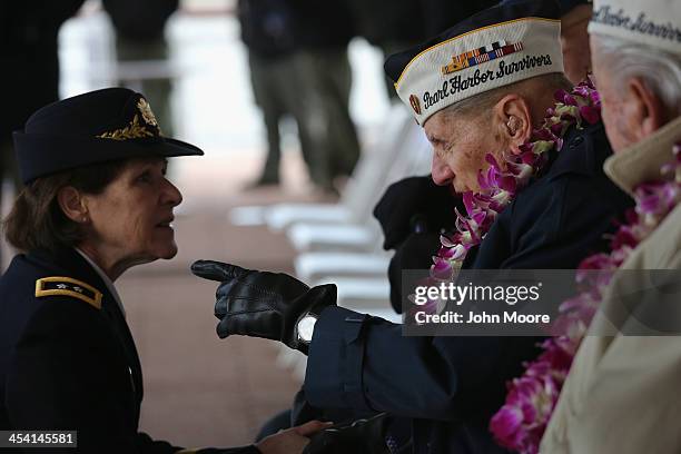 Pearl Harbor survivor Aaron Chavin speaks with U.S. Army Major General Margaret Boor at a ceremony marking the 72nd anniversary of the attack on...