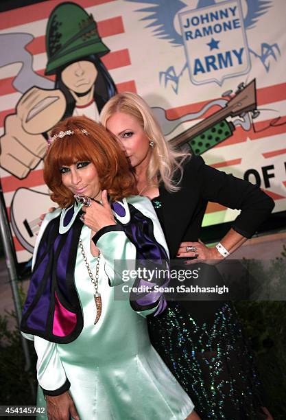 Linda Ramone and Tracy Lords pose back stage at the Johnny Ramone 10th Anniversary Celebration at Hollywood Forever on August 24, 2014 in Hollywood,...