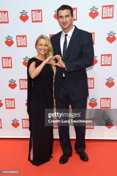 Hayden Panettiere and Wladimir Klitschko attend the Ein Herz Fuer Kinder Gala 2013 at Flughafen Tempelhof on December 7, 2013 in Berlin, Germany.