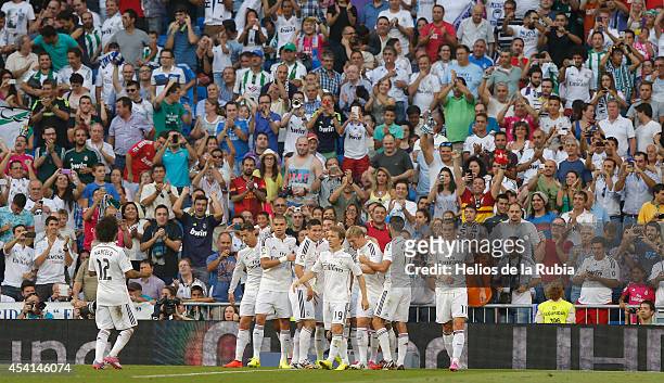 The players of Real Madrid celebrate after scoring during the La Liga match between Real Madrid CF and Cordoba CF at Estadio Santiago Bernabeu on...