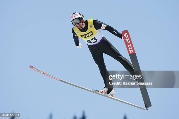 Mario Stecher of Austria competes during the FIS Nordic Combined World Cup HS106/10km on December 7, 2013 in Lillehammer, Norway.