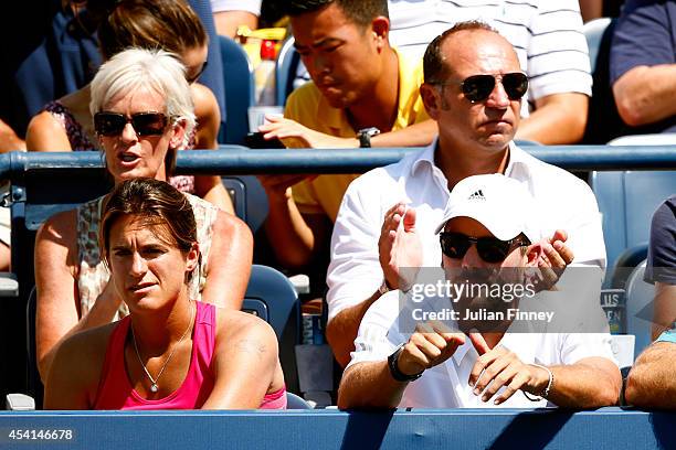 Judy Murray , Amelie Mauresmo and Daniel Vallverdu watch as, Andy Murray of Great Britain plays against Robin Haase of the Netherlands during his...