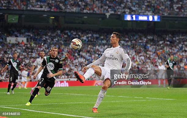 Cristiano Ronaldo of Real Madrid controls the ball the ball during the La liga match between Real Madrid CF and Cordoba CF at Estadio Santiago...