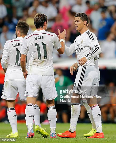 Cristiano Ronaldo of Real Madrid celebrates with Gareth Bale after scoring their team's second goal during the La Liga match between Real Madrid CF...