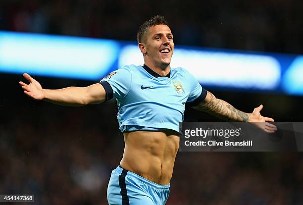 Stevan Jovetic of Manchester City celebrates scoring the second goal during the Barclays Premier League match between Manchester City and Liverpool...