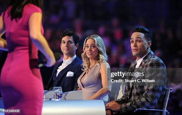 Adam Garcia, Kimberley Wyatt and Ashley Banjo judge the first live show of 2014's "Got To Dance" at Earls Court on August 25, 2014 in London, England.