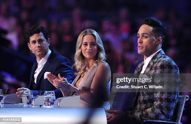 Adam Garcia, Kimberley Wyatt and Ashley Banjo judge the first live show of 2014's "Got To Dance" at Earls Court on August 25, 2014 in London, England.