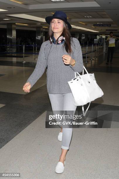 Emmy Rossum seen at LAX on August 25, 2014 in Los Angeles, California.