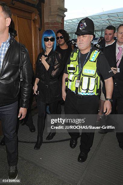 Katy Perry is seen at St Pancras railway station on March 19, 2012 in London, United Kingdom.