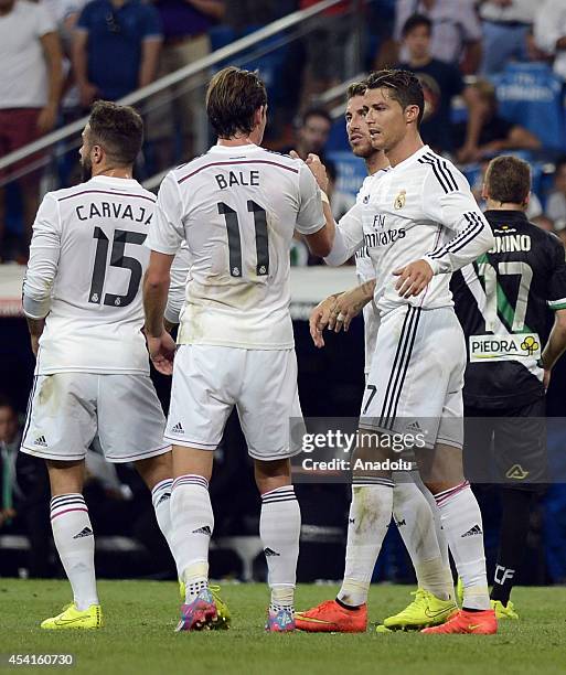 Real Madrid's Cristiano Ronaldo celebrates with his team mates after scoring during the La Liga match between Real Madrid CF vs Cordoba CF at the...