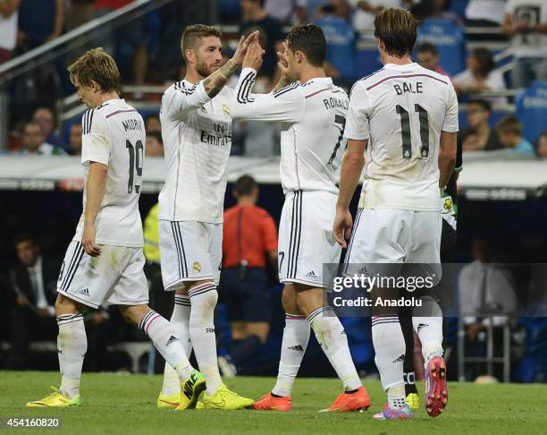 Real Madrid's Cristiano Ronaldo celebrates with his team mates after scoring during the La Liga match between Real Madrid CF vs Cordoba CF at the...