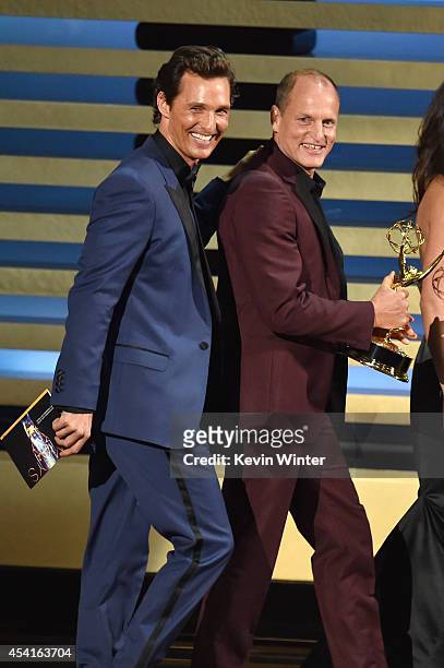 Actors Matthew McConaughey and Woody Harrelson walk onstage at the 66th Annual Primetime Emmy Awards held at Nokia Theatre L.A. Live on August 25,...