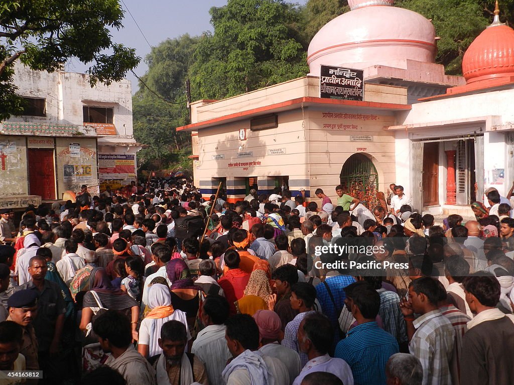 The  devotees  leave the Kamtanath Pahad temple after the...
