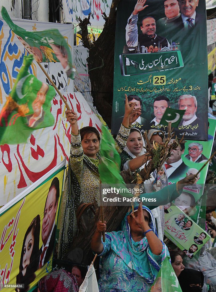 Supporters of the ruling Pakistan Muslim League-Nawaz (PML-N...