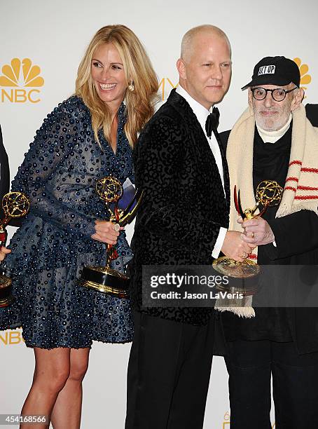 Actress Julia Roberts, producer/director Ryan Murphy and writer Larry Kramer pose in the press room at the 66th annual Primetime Emmy Awards at Nokia...