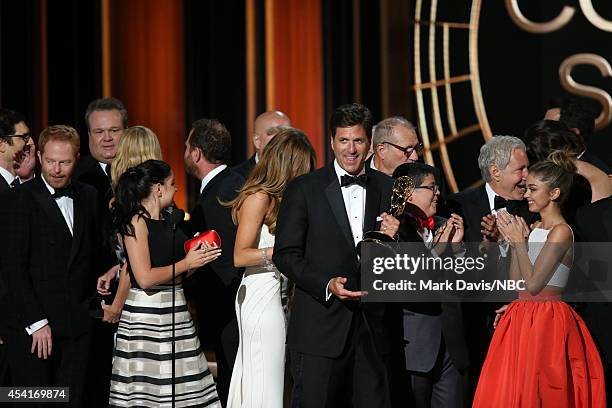 66th ANNUAL PRIMETIME EMMY AWARDS -- Pictured: Writer/producer Steven Levitan and fellow 'Modern Family' representatives accept the Outstanding...