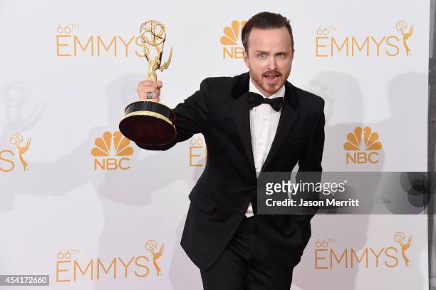 Actor Aaron Paul, winner of Outstanding Drama Series Award and Outstanding Supporting Actor in a Drama Series Award for "Breaking Bad" poses in the...
