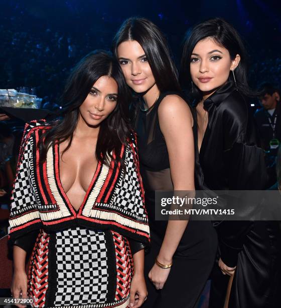 Personalities Kim Kardashian, Kendall Jenner and Kylie Jenner attend the 2014 MTV Video Music Awards at The Forum on August 24, 2014 in Inglewood,...