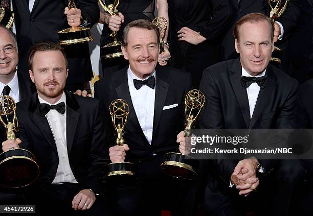 66th ANNUAL PRIMETIME EMMY AWARDS -- Pictured: Actors Aaron Paul, Bryan Cranston, and Bob Odenkirk, winners of Outstanding Drama Series for "Breaking...