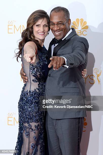 66th ANNUAL PRIMETIME EMMY AWARDS -- Pictured: Christine Lietz and actor Joe Morton pose in the press room during the 66th Annual Primetime Emmy...