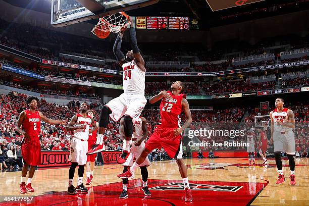 Montrezl Harrell of the Louisville Cardinals dunks the ball against the Louisiana-Lafayette Ragin' Cajuns during the game at KFC Yum! Center on...