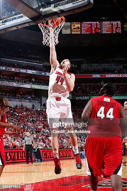 Stephan Van Treese of the Louisville Cardinals drives to the basket against the Louisiana-Lafayette Ragin' Cajuns during the game at KFC Yum! Center...