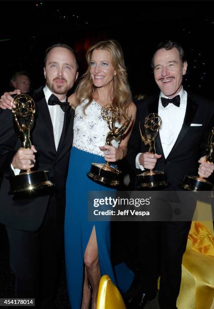 Actor Aaron Paul, actress Anna Gunn and actor Bryan Cranston attend the 66th Annual Primetime Emmy Awards Governors Ball held at Los Angeles...