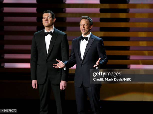 66th ANNUAL PRIMETIME EMMY AWARDS -- Pictured: Comedian Billy Eichner and host Seth Meyers on stage during the 66th Annual Primetime Emmy Awards held...