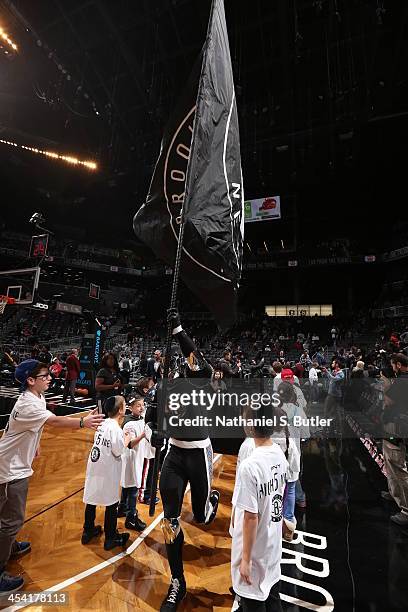 Brooklyn Knight of the Brooklyn Nets performs for the crowd against the Utah Jazz during a game at Barclays Center on November 5, 2013 in the...