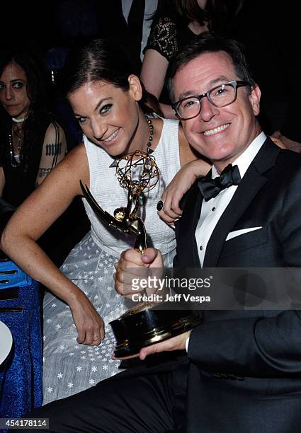 Comedian Stephen Colbert and guest attend the 66th Annual Primetime Emmy Awards Governors Ball held at Los Angeles Convention Center on August 25,...