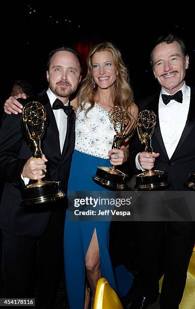 Actor Aaron Paul, actress Anna Gunn and actor Bryan Cranston attend the 66th Annual Primetime Emmy Awards Governors Ball held at Los Angeles...